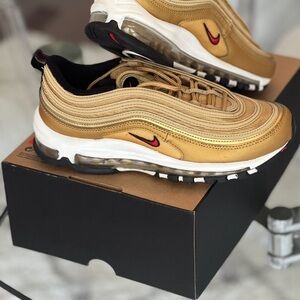 Nike Air Max 97 Gold and Black Athletic Shoes